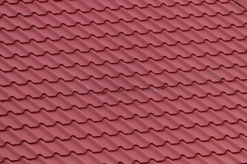 Roof red tiles as background.