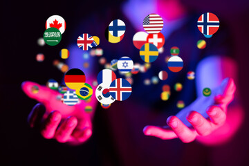 Image of hands gently holding various national flags, symbolizing global unity and international...