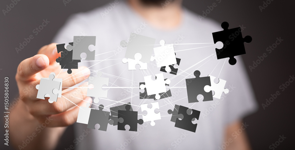 Poster abstract image of puzzle pieces interconnected, symbolizing teamwork, problem-solving, and strategic