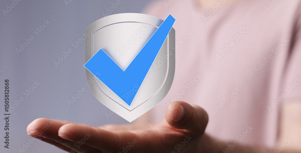 Poster Image of a hand holding a digital shield with a check mark, symbolizing data security and protection.