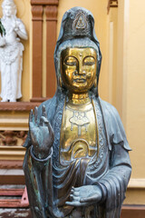 Fototapeta premium Guan Yin Statue at Gangaramaya Temple, Colombo, Sri Lanka