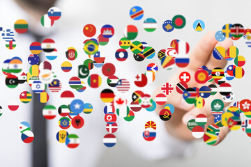 International networking, global reach, worldwide connections. Stock photo of flags.