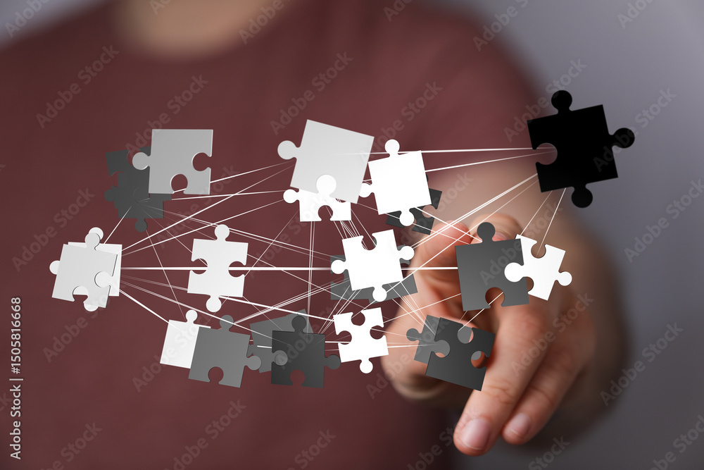 Poster abstract image of interconnected puzzle pieces, symbolizing teamwork, collaboration, and problem-sol