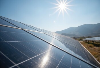 Solar panels reflecting sunlight in a scenic landscape with mountains