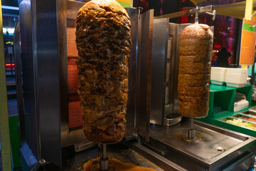 Shawarma and Doner Kebab Rotisseries, Night Market Food, Street Cuisine Preparation, Seoul, South Korea, Myeongdong Market