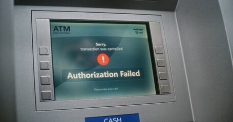 Unrecognizable Person Entering PIN Code on ATM Keypad to Withdraw Money. Error Message on Cash...