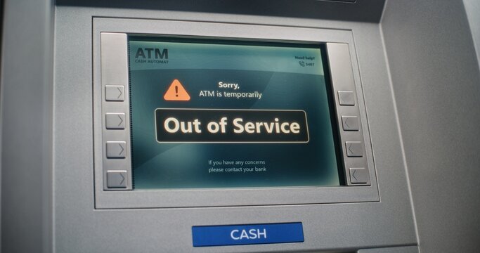 ATM Machine Screen Displaying Error Message Due to System Failure. Out of Service Cash Machine, Banking Transactions Temporarily Unavailable. Broken Banking Equipment, Server Not Working. Close Up.