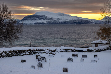 Cemetery and Norwegian sea in the sunrise, Norway