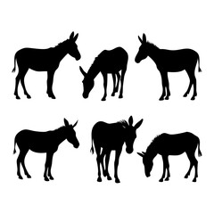 Fototapeta premium Donkey Silhouettes in Standing and Grazing Positions – Vector Farm Animal Graphics for Agriculture Art, Rustic Decor, Educational Materials, Livestock Illustrations, and Craft Projects