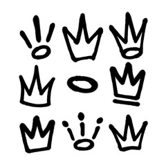 Big set of sprayed crown in graffiti style. Vector illustration.