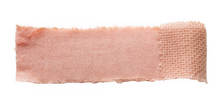 Close-up of a light peach-colored bandage strip, showcasing its soft texture and slightly frayed edges against a white background.