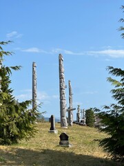 Namgis First Nation Totem poles, Namgis Burial Grounds, the Village of Alert Bay, Cormorant Island, British Columbia. Canada