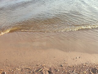 gentle coastal waves on the seashore