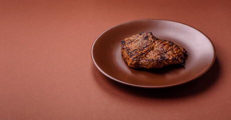Meat, steak, beef tenderloin cooked on grill. Juicy steak as a food background