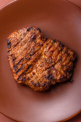 Meat, steak, beef tenderloin cooked on grill. Juicy steak as a food background