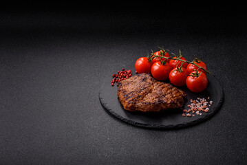 Meat, steak, beef tenderloin cooked on grill. Juicy steak as a food background