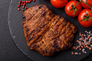 Meat, steak, beef tenderloin cooked on grill. Juicy steak as a food background