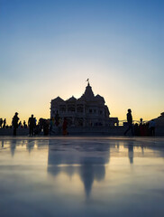 ancient hindu temple architecture with blue bright sunrise sky at dawn from flat angle