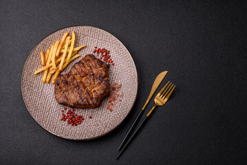 Meat, steak, beef tenderloin cooked on grill. Juicy steak as a food background
