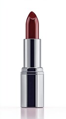 Deep Red Lipstick Stands Upright on a White Background for a Striking Beauty Presentation