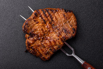 Meat, steak, beef tenderloin cooked on grill. Juicy steak as a food background