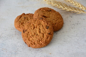 Delicious Oatmeal Cookies on a Textured Surface