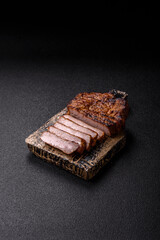 Meat, steak, beef tenderloin cooked on grill. Juicy steak as a food background