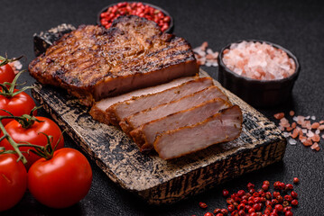 Meat, steak, beef tenderloin cooked on grill. Juicy steak as a food background