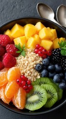 Colors and textures combine in a tantalizing fruit and granola bowl, creatively arranged for a delightful culinary experience
