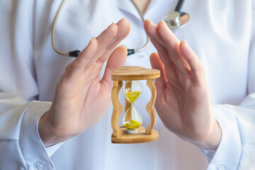 Time protected by the hands of a physician.