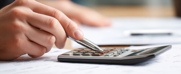 The calculator on a desk being used for important financial calculations.