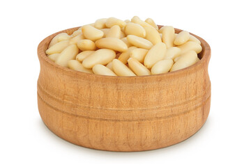 Shelled European pine nuts in wooden bowl isolated on white background with full depth of field