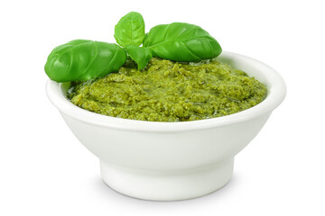 Pesto sauce in ceramic bowl isolated on white background. Top view. Flat lay