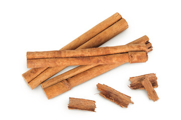 Cinnamon sticks isolated on white background with full depth of field. Top view. Flat lay.