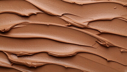 Obraz premium Melted milk chocolate swirls creating a smooth texture