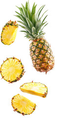 A whole pineapple with green leaves and several slices of pineapple on a black background isolated