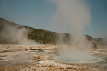 Beautiful steaming hot spring scenery at Yellowstone National Park Wyoming