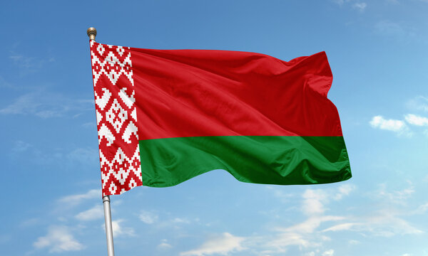 Belarus national flag flying in blue sky