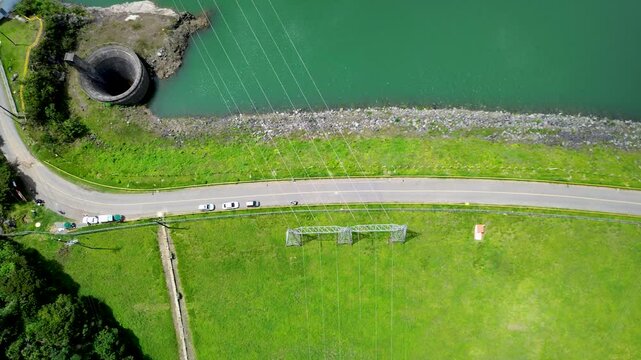 Renewable Energy Infrastructure with Lake and Dam. High quality 4k footage
