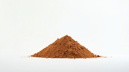 a pile of dirt sitting on top of a white surface