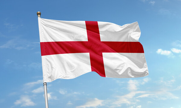 England flag with red Saint George's cross waving in sky - Powered by Adobe