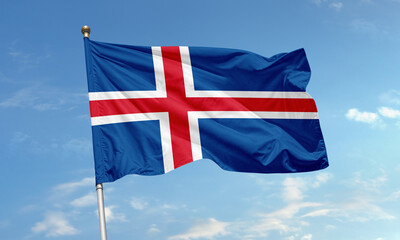 Iceland national flag waving in blue sky