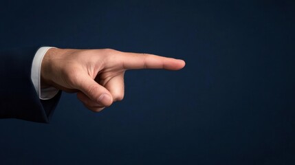 a man in a suit pointing at something