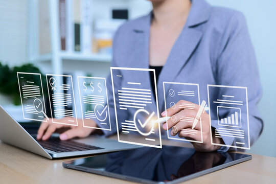 Document review and quality control process concept. Businesswoman using laptop with document and checkmark icons represents review, validation, auditing, verification, approval, compliance, workflow,