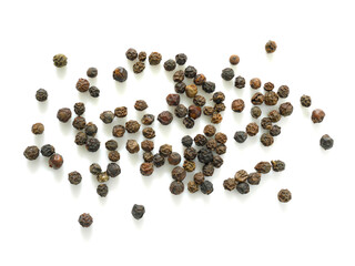 Pile of black peppercorns isolated on white background