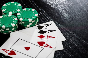 Obraz premium Casino chips and cards on the table. Gambling concept