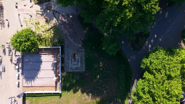 Drone view of Lake Aasee, recreation areas and tennis courts in Ibbenbueren, Germany