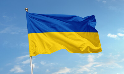 Ukrainian flag waving under blue sky