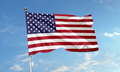 American flag waving in clear blue sky