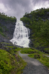 Fototapeta premium The beautiful Fossen Bratte waterfall and surrounding area near Bergen (Norway)